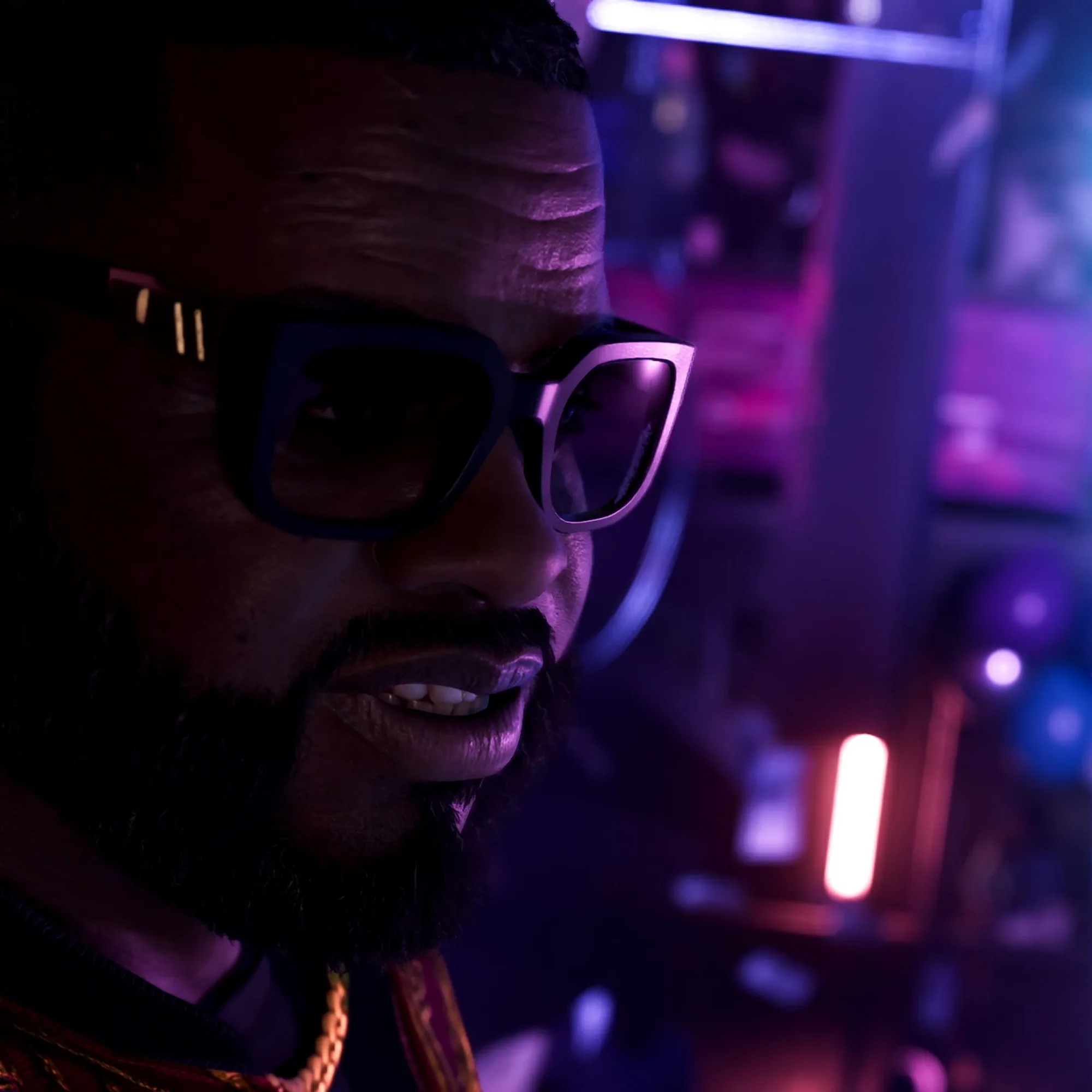 A person in large white-framed sunglasses is lit by purple and pink neon in a night-time urban setting.